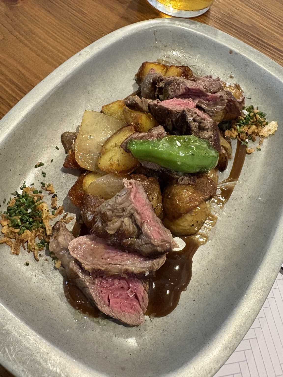 Grilled steak with vegetables at La Brunilda in Seville